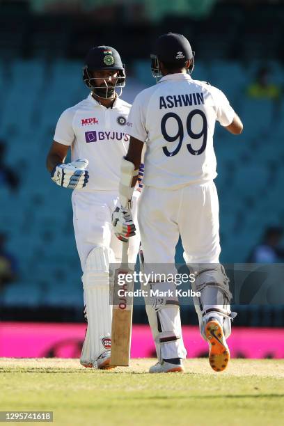 Hanuma Vihari and Ravichandran Ashwin of India celebrate during day five of the Third Test match in the series between Australia and India at Sydney...