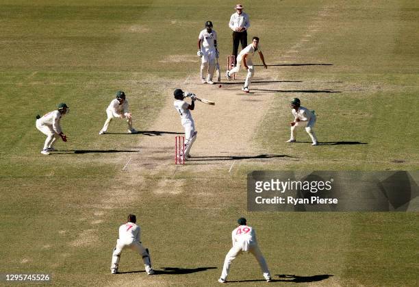 Hanuma Vihari of India plays a ball from Pat Cummins of Australia during day five of the 3rd Test match in the series between Australia and India at...