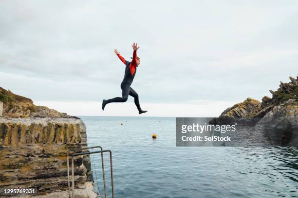 leap of faith - person diving stock pictures, royalty-free photos & images