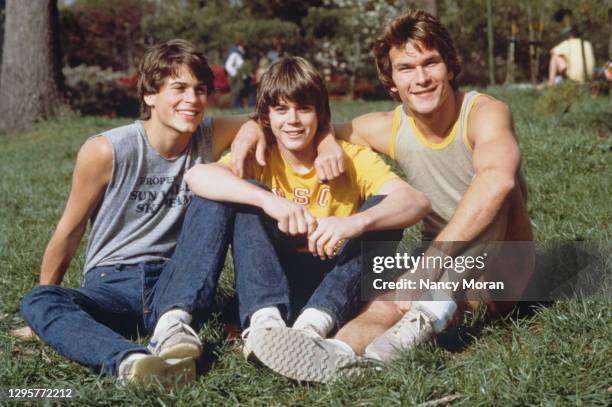 Rob Lowe, C. Thomas Howell and Patrick Swayze on the set of "The Outsiders".