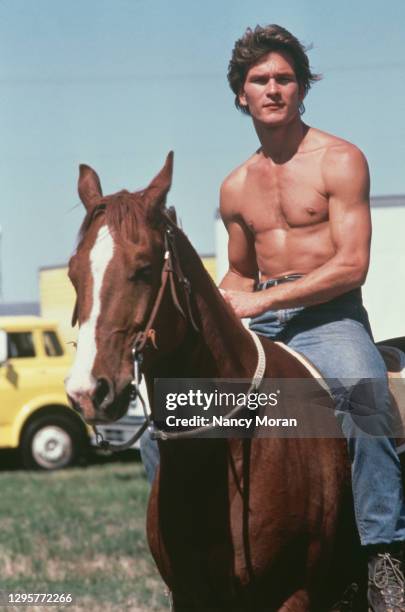 Patrick Swayze on the set of "The Outsiders".