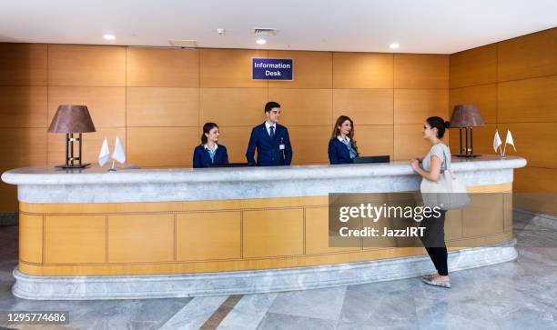 hospital patient reception desk - reception desk stock pictures, royalty-free photos & images