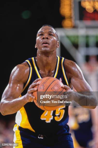 Chuck Person, Power Forward for the Indiana Pacers attempts a free throw during the NBA Midwest Division basketball game against the Denver Nuggets...