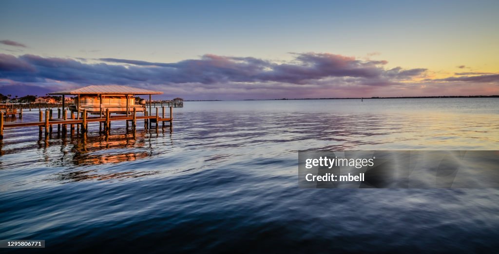 Boat Piers on the Indian River - Melbourne Beach FL at dusk
