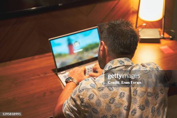 studying late at home - back of heads stock pictures, royalty-free photos & images