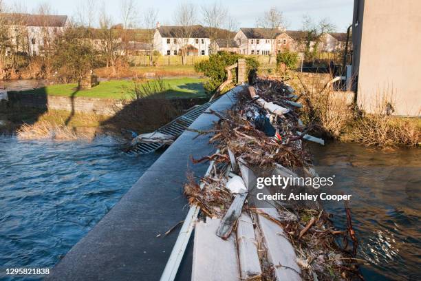 a foot bridge in cockermouth, cumbria, uk, which was damaged by floods. - cockermouth stock pictures, royalty-free photos & images