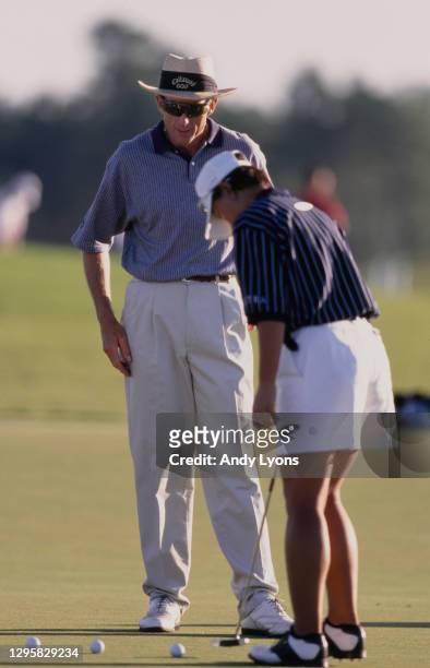 Golf instructor coach David Leadbetter and Se Ri Pak of South Korea during putting practice for the LPGA Qualifying Tournament on 24th October 1997...