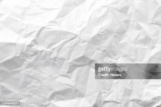 texture of crumpled white paper - wrinkled stockfoto's en -beelden