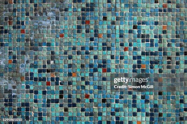old, damaged predominantly blue mosaic tile wall - mosaik bildbanksfoton och bilder