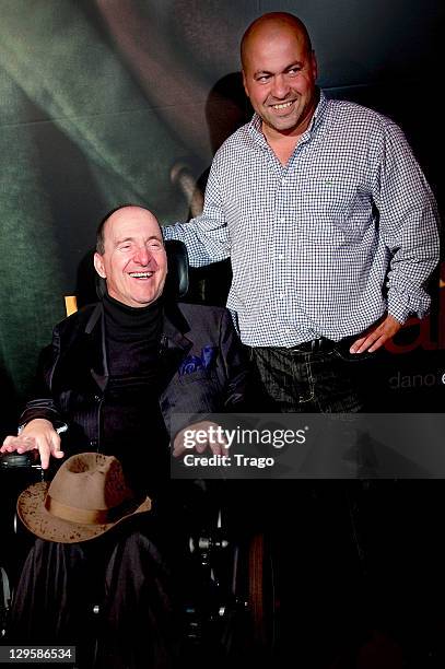 Philippe Pozzo Di Borgo and Abdel Sellou attend the Paris premiere of 'Intouchables' at Cinema Gaumont Marignan on October 18, 2011 in Paris, France.