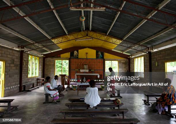 People inside a church, New Ireland Province, Langania, Papua New Guinea on September 27, 2009 in Langania, Papua New Guinea.