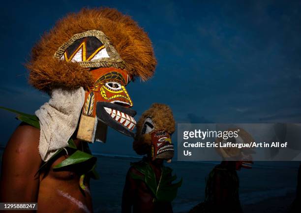 Malagan tatuana masks dance during a funeral ceremony, New Ireland Province, Langania, Papua New Guinea on September 27, 2009 in Langania, Papua New...