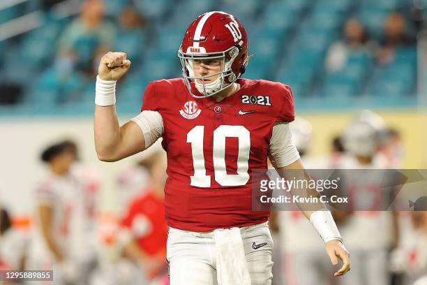 Mac Jones of the Alabama Crimson Tide reacts to a touchdown during the second quarter of the College Football Playoff National Championship game...