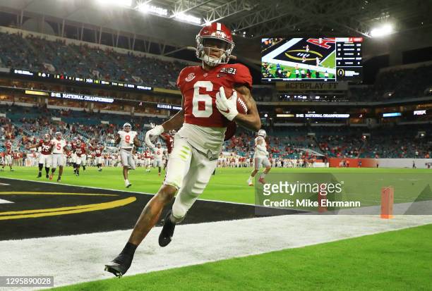 DeVonta Smith of the Alabama Crimson Tide rushes for a five yard touchdown during the second quarter of the College Football Playoff National...