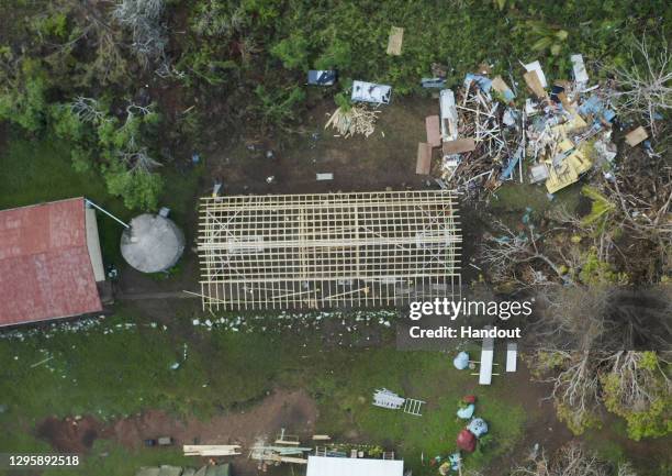 In this handout provided by the Australian Department of Defence, aerial shots of the Galoa Island primary school re-construction after Tropical...