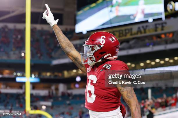 DeVonta Smith of the Alabama Crimson Tide celebrates his touchdown during the second quarter of the College Football Playoff National Championship...