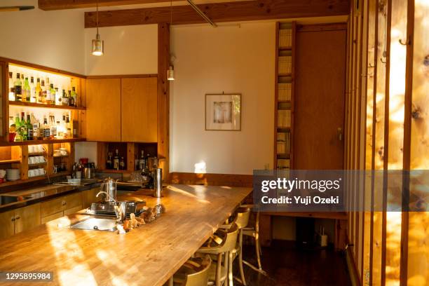 inside a woody mountain lodge-style cafe restaurant - rustic dining room stock pictures, royalty-free photos & images