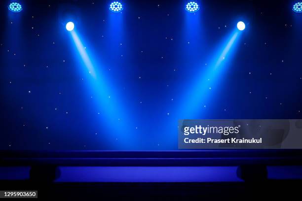 colorful bright stage lights in a concert - presentation party stockfoto's en -beelden