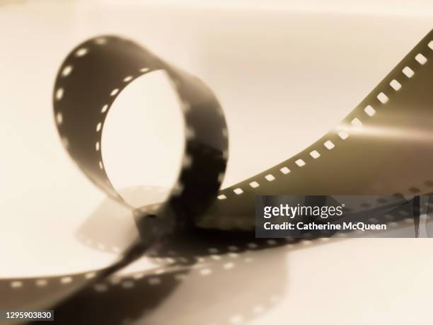 roll of unprocessed camera film - gifted film fotografías e imágenes de stock
