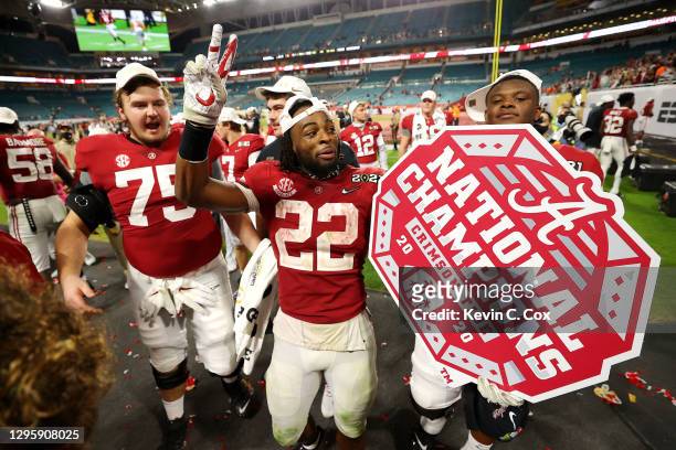 Najee Harris of the Alabama Crimson Tide celebrates following the College Football Playoff National Championship game win over the Ohio State...