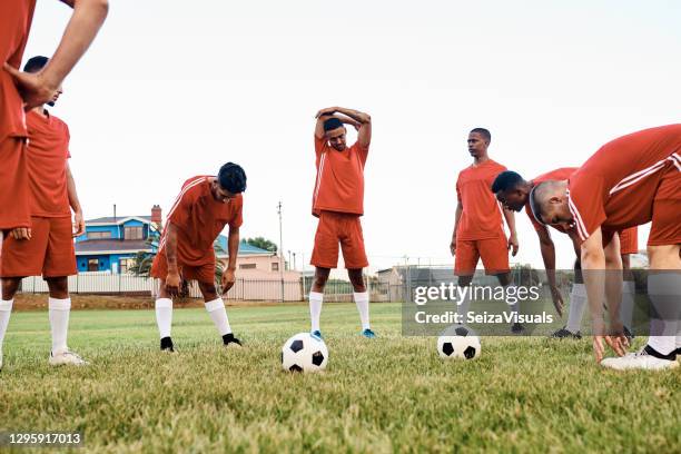 the guys have a very important match coming up - soccer team stock pictures, royalty-free photos & images