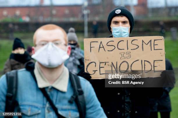 Protesters are seen during an anti-fascism protest in the Westerpark on January 10, 2021 in Amsterdam, Netherlands.