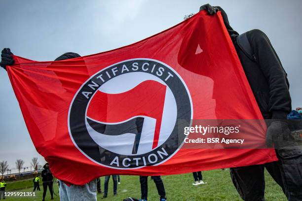 Protester is seen during an anti-fascism protest in the Westerpark on January 10, 2021 in Amsterdam, Netherlands.