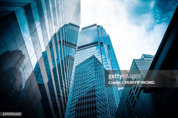 hong kong central district skyscrapers - skyscraper stock pictures, royalty-free photos & images