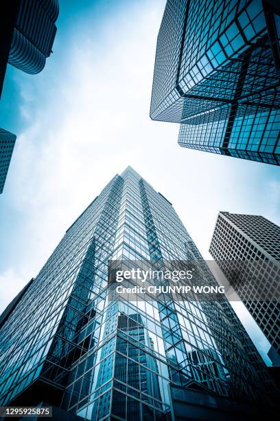 hong kong central district skyscrapers - buildings looking up stock pictures, royalty-free photos & images