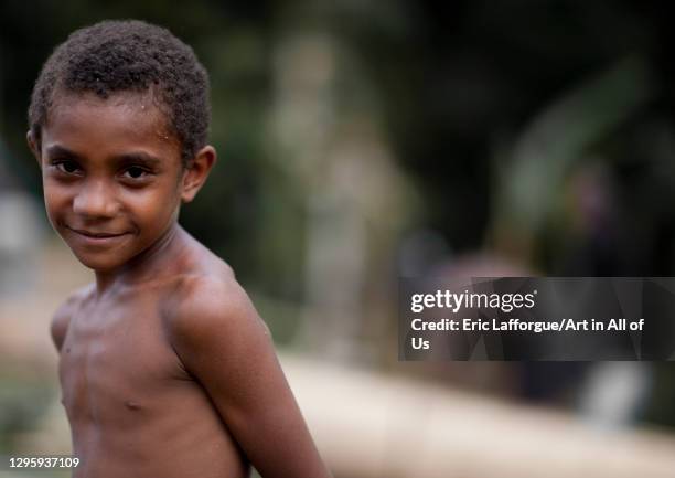 Portrait of shirtless boy, Milne Bay Province, Alotau, Papua New Guinea on October 3, 2009 in Alotau, Papua New Guinea.