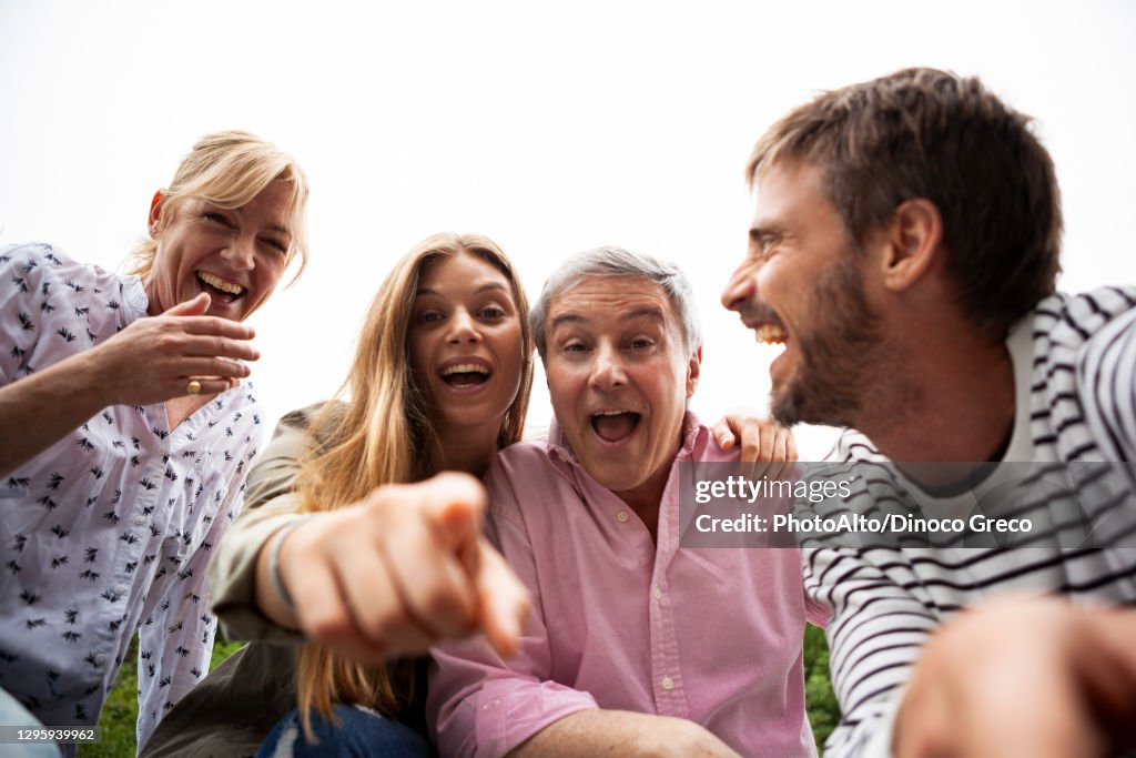 Portrait of happy family sitting together