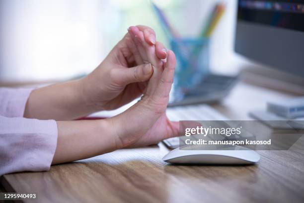 wrist pain. - neuropathy stock pictures, royalty-free photos & images