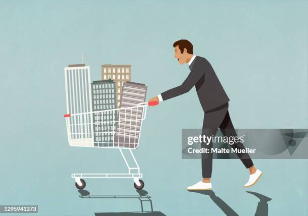 businessman pushing skyscrapers in shopping cart - gewerbeimmobilie stock-grafiken, -clipart, -cartoons und -symbole