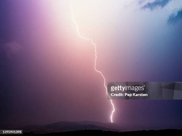 lightning bolt in majestic stormy sky, tanneron, french riviera, france - rayo fotografías e imágenes de stock