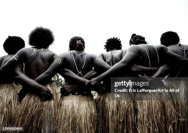 Women in traditional clothing dancing in line, Autonomous Region of Bougainville, Bougainville, Papua New Guinea on October 11, 2009 in Bougainville,...