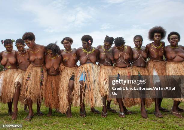 Women in traditional clothing dancing in line, Autonomous Region of Bougainville, Bougainville, Papua New Guinea on October 11, 2009 in Bougainville,...