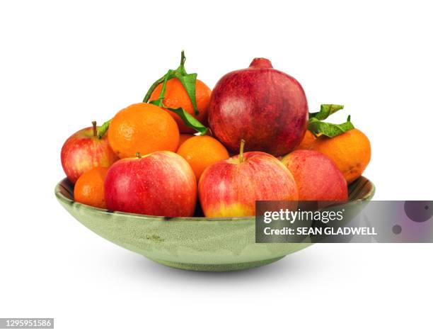 bowl of fruit - obstschale stock-fotos und bilder