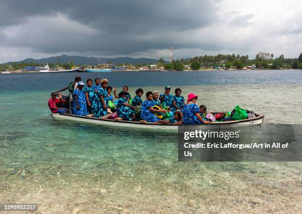 Women in a boat, Autonomous Region of Bougainville, Bougainville, Papua New Guinea on October 11, 2009 in Bougainville, Papua New Guinea.