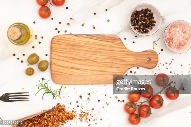 wooden cutting board and ingredients - cutting board stock pictures, royalty-free photos & images