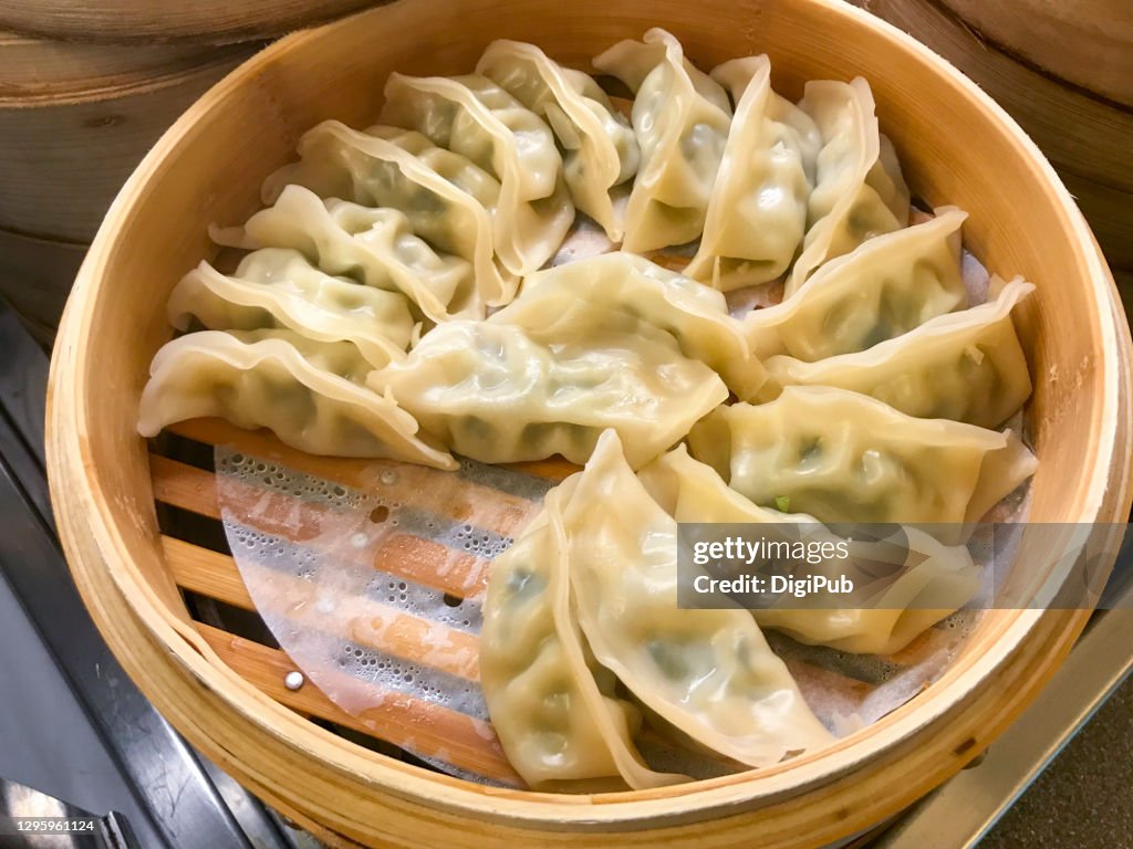 Steamed dumplings in steamer, jiaozi