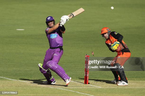 Peter Handscomb of the Hurricanes is bowled out by Fawad Ahmed of the Scorchers during the Big Bash League match between the Perth Scorchers and the...