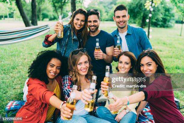 friends having fun on garden party - university student picnic stock pictures, royalty-free photos & images