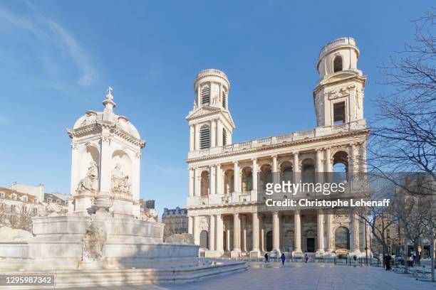 the saint sulpice church and fountain, in paris - saint germain stock pictures, royalty-free photos & images