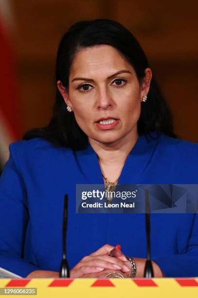 United Kingdom Home Secretary Priti Patel talks at a coronavirus press conference at Downing Street on January 12, 2021 in London, England. The Home...