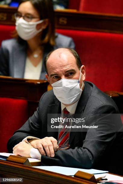 French Prime Minister Jean Castex looks on as Ministers answer questions from deputies during the weekly session of questions to the government at...