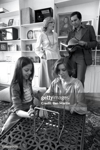 Barbara Bain and Martin Landau with daughters Susan and Juliet at home in Chester Square, London, June 1976.