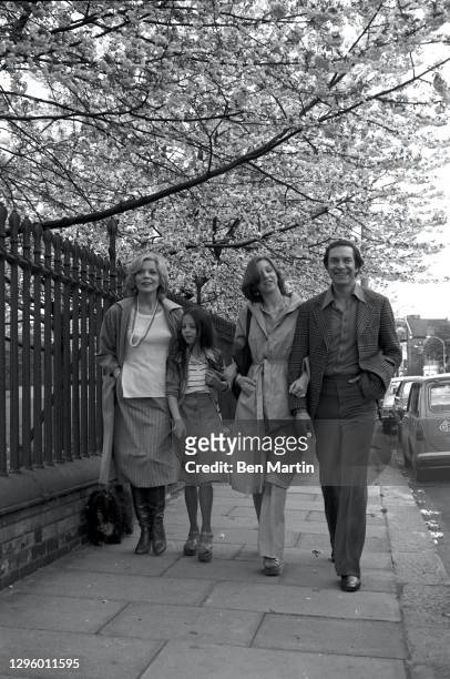 Barbara Bain and Martin Landau with daughters Susan and Juliet walking in Chester Square, London, June 1976.