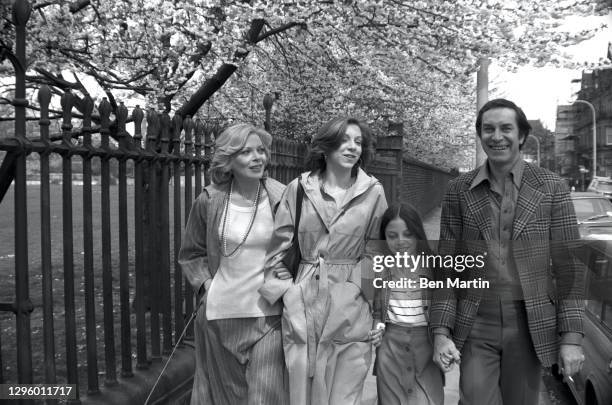 Barbara Bain and Martin Landau with daughters Susan and Juliet walking in Chester Square, London, June 1976.