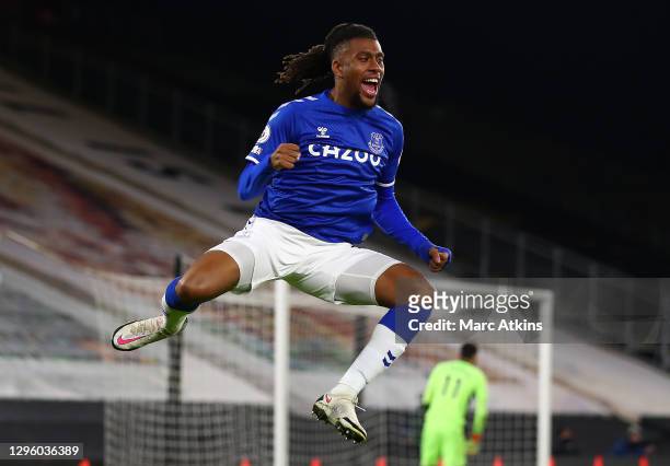 Alex Iwobi of Everton celebrates after scoring his team's first goal during the Premier League match between Wolverhampton Wanderers and Everton at...