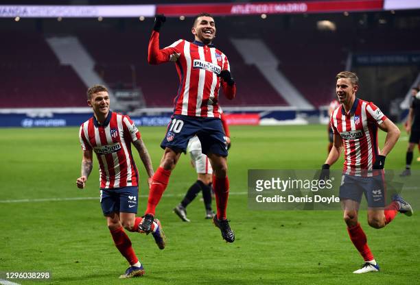 Angel Correa of Atletico de Madrid celebrates after scoring their team's first goal during the La Liga Santander match between Atletico de Madrid and...